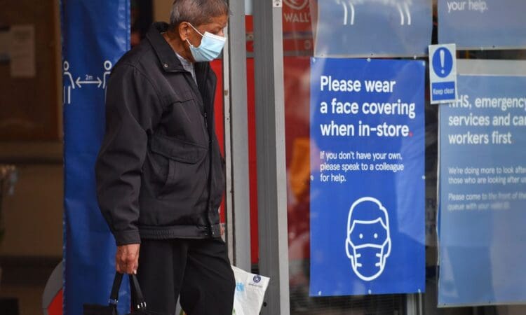 Commuter wearing mask