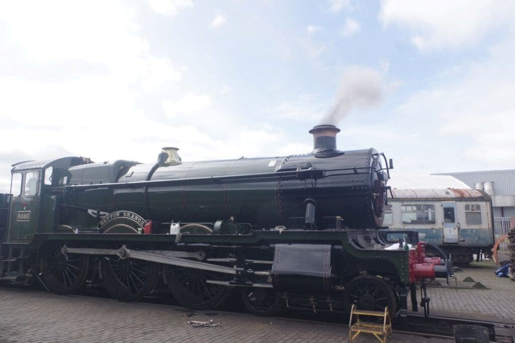 Side view of Great Western Railway's new build steam engine 4-6-0 No. 688 Betton Grange at Tyseley Locomotive Works